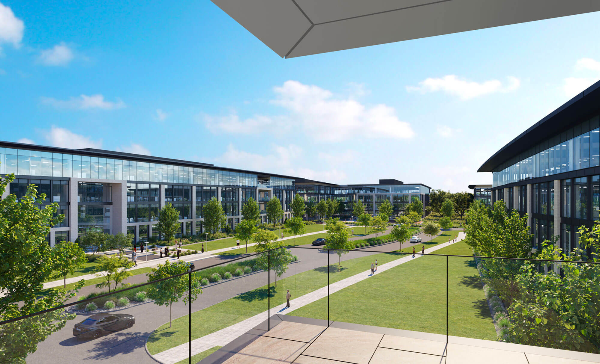 View from balcony at Duval office park overlooking tree-lined roads and modern buildings.