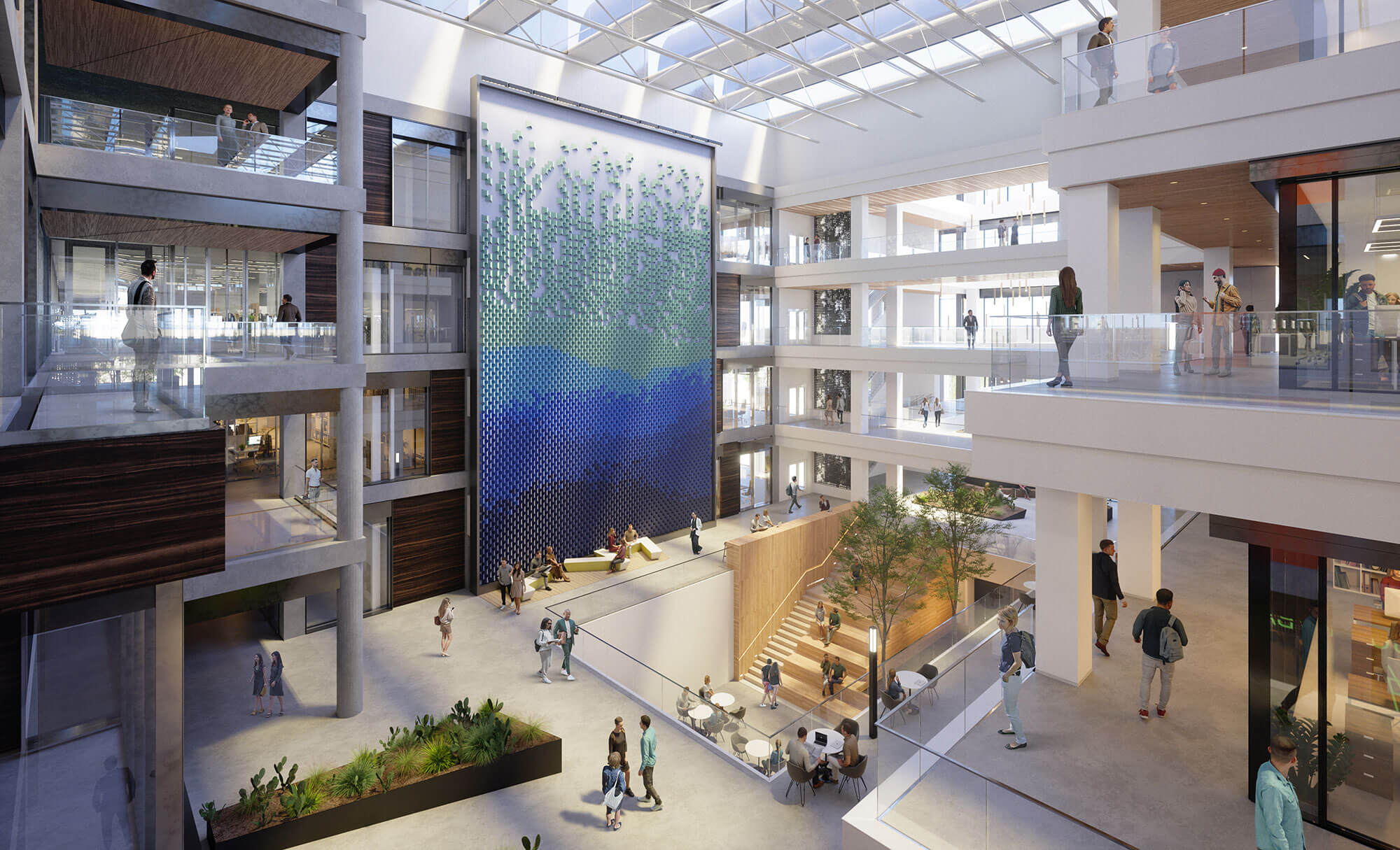 People interacting in Highpoint's airy atrium with vibrant wall art and glass balconies