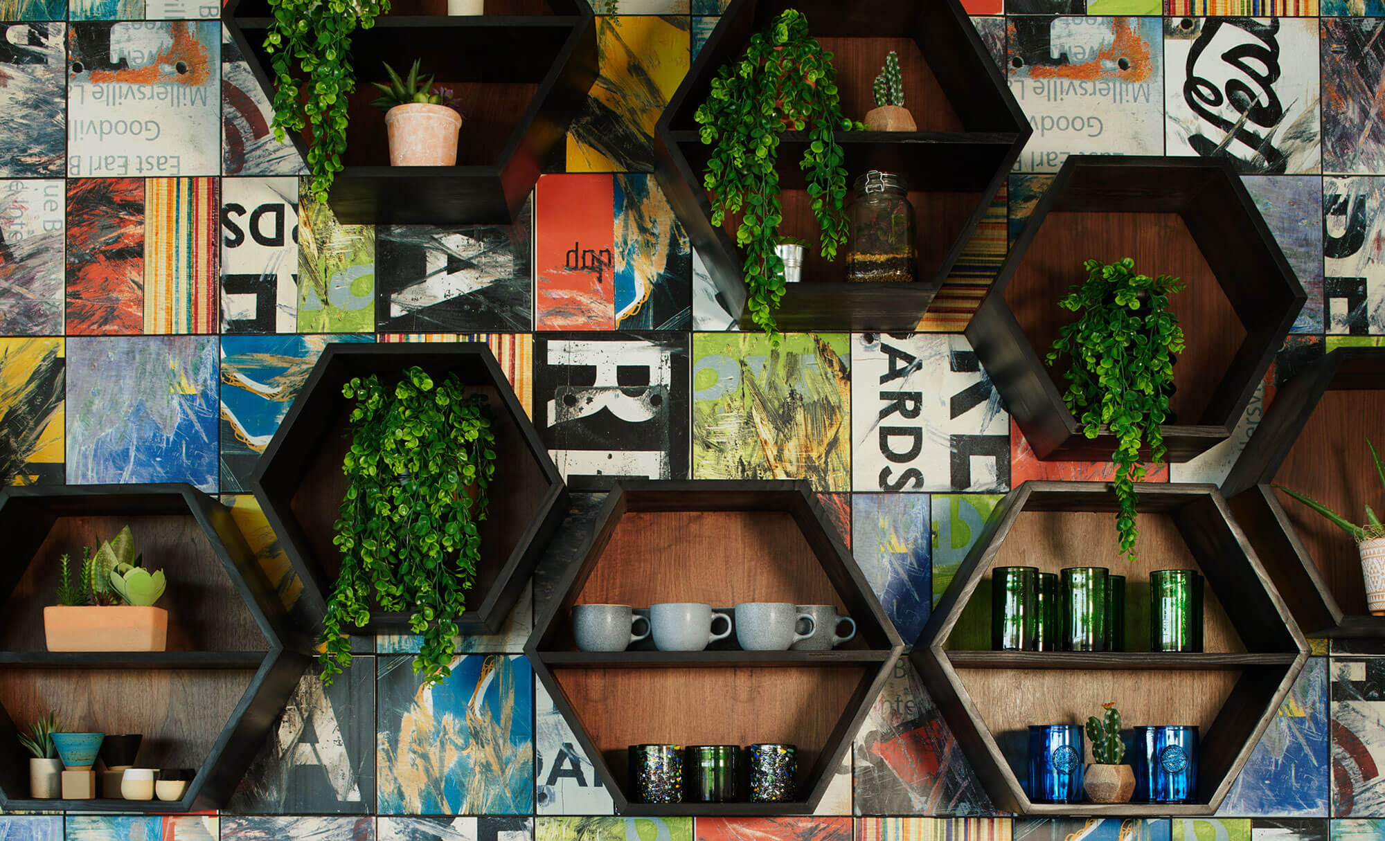 Highpoint's stylish shelving units featuring plants and vibrant, artistic tiles